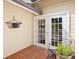 Deck access with french doors and tiled flooring at 300 Spring Run Cir, Longwood, FL 32779