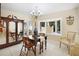 Bright dining room featuring a bay window and antique furniture at 300 Spring Run Cir, Longwood, FL 32779