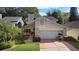 Two-story house with attached garage and stone accents at 300 Spring Run Cir, Longwood, FL 32779