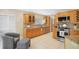 Bright kitchen with granite countertops, stainless steel appliances, and wood cabinets at 300 Spring Run Cir, Longwood, FL 32779