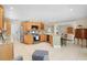 Open kitchen with granite counters, stainless steel appliances, and wood cabinets at 300 Spring Run Cir, Longwood, FL 32779