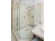 Large walk-in shower with double shower heads and glass enclosure at 300 Spring Run Cir, Longwood, FL 32779