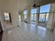 Bright Florida room with tile floors and access to the patio at 3218 Stonehurst Cir, Kissimmee, FL 34741