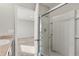 Bathroom with a shower and glass sliding door at 371 Arbor Lakes Dr, Davenport, FL 33896