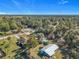 Aerial view showing home's location and nearby houses at 40501 W 5Th Ave, Umatilla, FL 32784