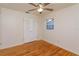 Bright bedroom with hardwood floors and a double door closet at 4272 Kendrick Rd, Orlando, FL 32804