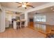 Open kitchen with breakfast bar and views of the living room and Gathering room at 4272 Kendrick Rd, Orlando, FL 32804