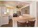 Kitchen with stainless steel appliances and breakfast bar at 4272 Kendrick Rd, Orlando, FL 32804