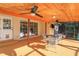 Covered patio furniture near the pool and sliding doors at 4272 Kendrick Rd, Orlando, FL 32804