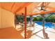 Covered patio overlooking the pool and backyard at 4272 Kendrick Rd, Orlando, FL 32804
