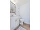 Clean bathroom with white vanity and toilet at 4501 S Atlantic Ave # 4090, New Smyrna Beach, FL 32169