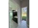 View of backyard from bathroom, showing access to green space at 547 Sanctuary Golf Pl, Apopka, FL 32712
