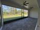 Screened lanai with tiled flooring, offering backyard views at 547 Sanctuary Golf Pl, Apopka, FL 32712