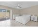 Well-lit bedroom with a queen-sized bed and ample closet space at 557 E Orange St, Altamonte Springs, FL 32701