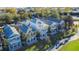 Aerial view of houses near a golf course at 7405 Excitement Dr, Kissimmee, FL 34747
