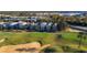 Aerial view of homes near a golf course at 7405 Excitement Dr, Kissimmee, FL 34747