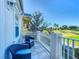 Balcony with golf course view and seating at 7405 Excitement Dr, Kissimmee, FL 34747