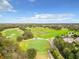 Expansive golf course with lush fairways and beautiful landscaping at 7405 Excitement Dr, Kissimmee, FL 34747