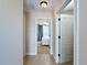 Bright hallway with access to bedrooms and other rooms at 7405 Excitement Dr, Kissimmee, FL 34747