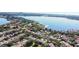 Wide aerial view of neighborhood and lake at 8320 Via Bella Notte, Orlando, FL 32836