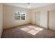Bright bedroom with window and ceiling fan at 8320 Via Bella Notte, Orlando, FL 32836