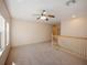 Bonus room featuring carpet and ceiling fan at 8320 Via Bella Notte, Orlando, FL 32836