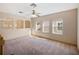 Large bonus room with carpet and natural light at 8320 Via Bella Notte, Orlando, FL 32836