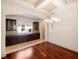 Formal dining room with hardwood floors and built-in cabinetry at 8320 Via Bella Notte, Orlando, FL 32836