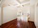 Formal dining room with hardwood floors, a chandelier, and built-in cabinetry at 8320 Via Bella Notte, Orlando, FL 32836