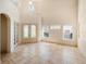 Elegant entryway with double doors, tile floors, and natural light at 8320 Via Bella Notte, Orlando, FL 32836