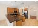 Modern kitchen featuring granite countertops and stainless steel appliances at 8320 Via Bella Notte, Orlando, FL 32836