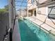 Long refreshing pool with screened enclosure at 8320 Via Bella Notte, Orlando, FL 32836