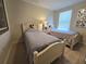 Bedroom with two twin beds, ideal for children at 9037 Shadow Mountain St, Davenport, FL 33896