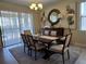 Elegant dining room featuring a large table and access to the backyard at 9037 Shadow Mountain St, Davenport, FL 33896