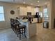 Modern kitchen with stainless steel appliances and granite countertops at 9037 Shadow Mountain St, Davenport, FL 33896