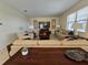 Comfortable living room with ample seating and large TV at 9037 Shadow Mountain St, Davenport, FL 33896