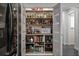 Well-organized pantry with ample shelving for storage at 909 Cutler Rd, Longwood, FL 32779