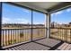 Enjoy serene lake views from this screened balcony at 12164 Eastmoor Dr, Winter Garden, FL 34787