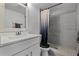 Clean bathroom with a white vanity and a shower/tub combination at 126 Scottsdale Sq # 126, Winter Park, FL 32792
