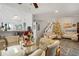 Open concept dining room with a view of the living room and kitchen at 126 Scottsdale Sq # 126, Winter Park, FL 32792