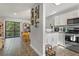 Modern kitchen with stainless steel appliances and granite countertops at 126 Scottsdale Sq # 126, Winter Park, FL 32792