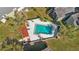 An aerial view of a community pool with surrounding landscaping at 126 Scottsdale Sq # 126, Winter Park, FL 32792