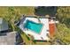 Communal pool area with surrounding patio at 126 Scottsdale Sq # 126, Winter Park, FL 32792