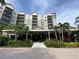 Building exterior showcasing the entrance and landscaping at 14501 Grove Resort Ave # 2716, Winter Garden, FL 34787