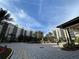 Community view with building exteriors and courtyard at 14501 Grove Resort Ave # 2716, Winter Garden, FL 34787