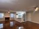 Open living area with hardwood floors and kitchen at 2205 12Th Nw St, Winter Haven, FL 33881