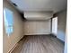 Simple spare bedroom with vinyl flooring and neutral walls at 2205 12Th Nw St, Winter Haven, FL 33881