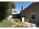 Backyard view showing house exterior and landscaping at 259 New Waterford Pl, Longwood, FL 32779