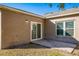 Backyard with patio and sliding glass door at 422 Columbia Ct, Kissimmee, FL 34759