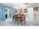 Dining area with wooden table and chairs, near kitchen at 4731 Larchmont Ct, Orlando, FL 32821